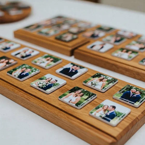 Finished wedding photo magnets displayed on a wooden gallery board